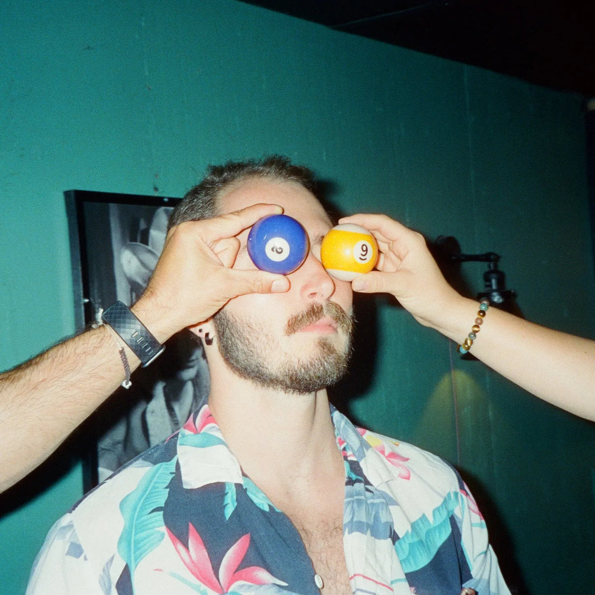 35mm sample photo of guy playing pool taken with Canon Sure Shot Telemax