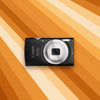 Canon Powershot ELPH 135 on an orange and beige striped background