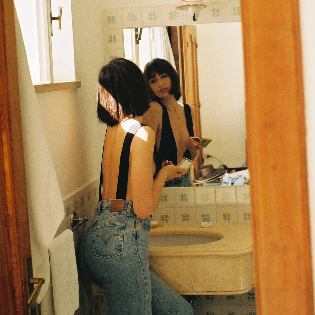 image of women getting ready taken with the Canon AF35M 35mm Point and Shoot Film Camera