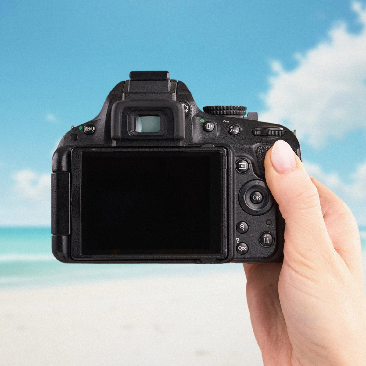 Back view of the Nikon D5100 DSLR camera showing its articulating LCD screen and controls
