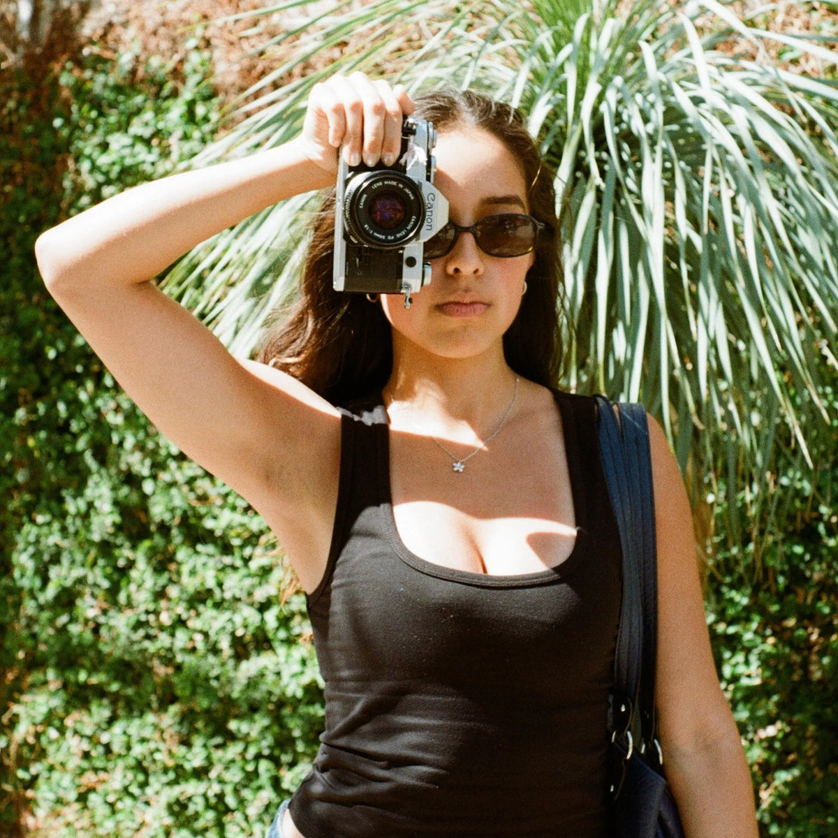 Girl with Canon AE-1 Photographed with a Canon AE-1 35mm film camera