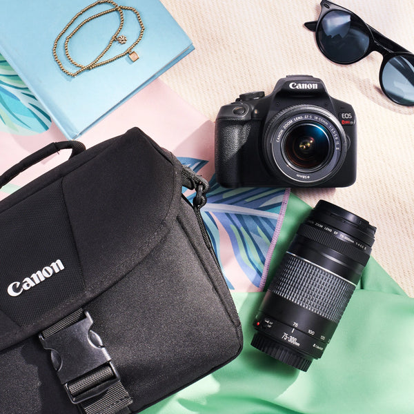 Canon Rebel T7 dual-lens kit arranged with a camera bag and colorful accessories