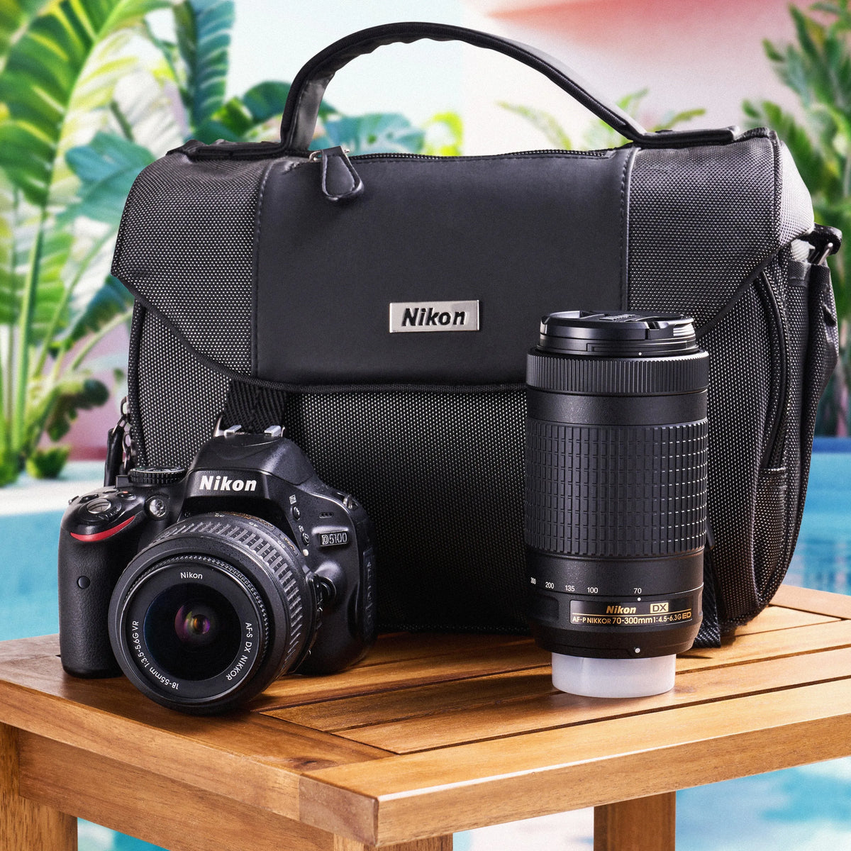 Nikon D5100 dual-lens camera kit with DSLR body, two lenses and Nikon camera bag