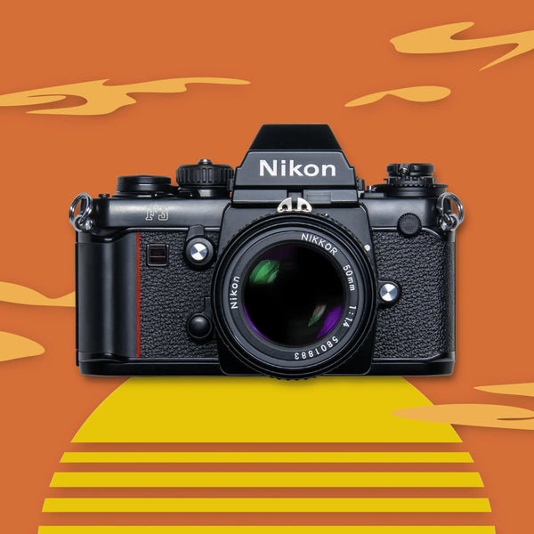 Nikon F3 35mm Film Camera on an orange and yellow abstract background