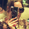 woman with Olympus Trip 35 Point and Shoot Film Camera
