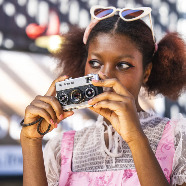 woman with the Rollei 35 Compact 35mm film camera