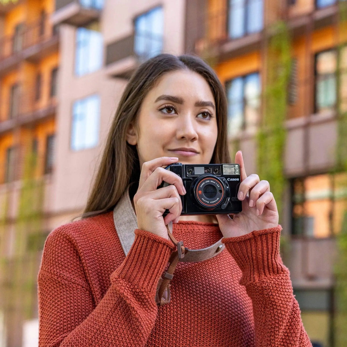 woman with Canon AF35M 35mm Point and Shoot Film Camera