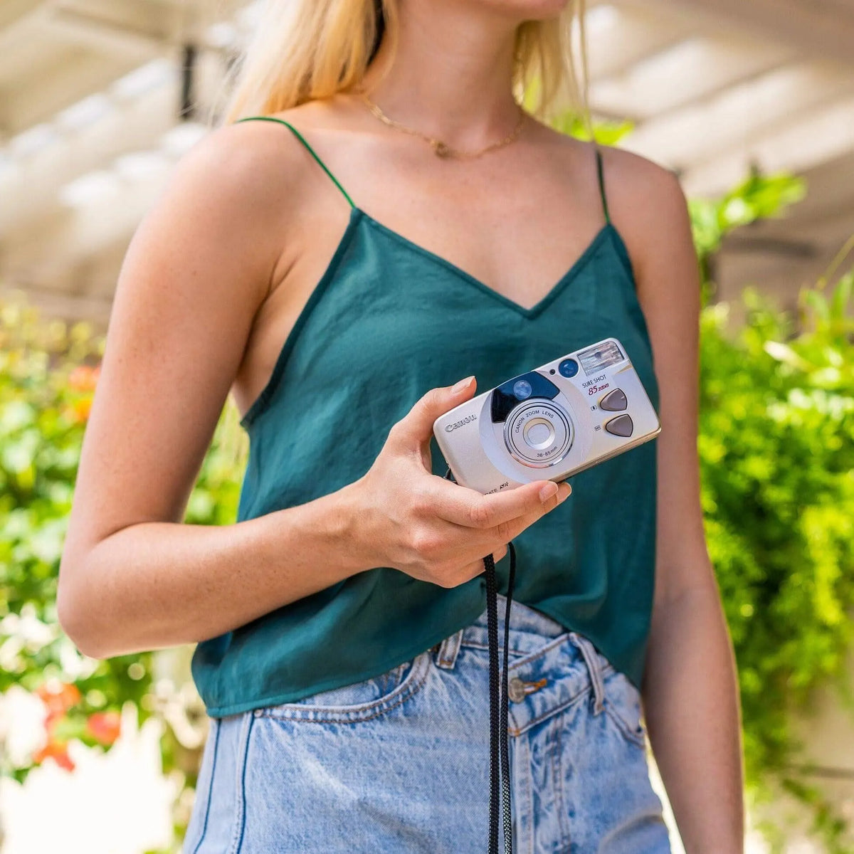women with Canon Sure Shot 85 Zoom