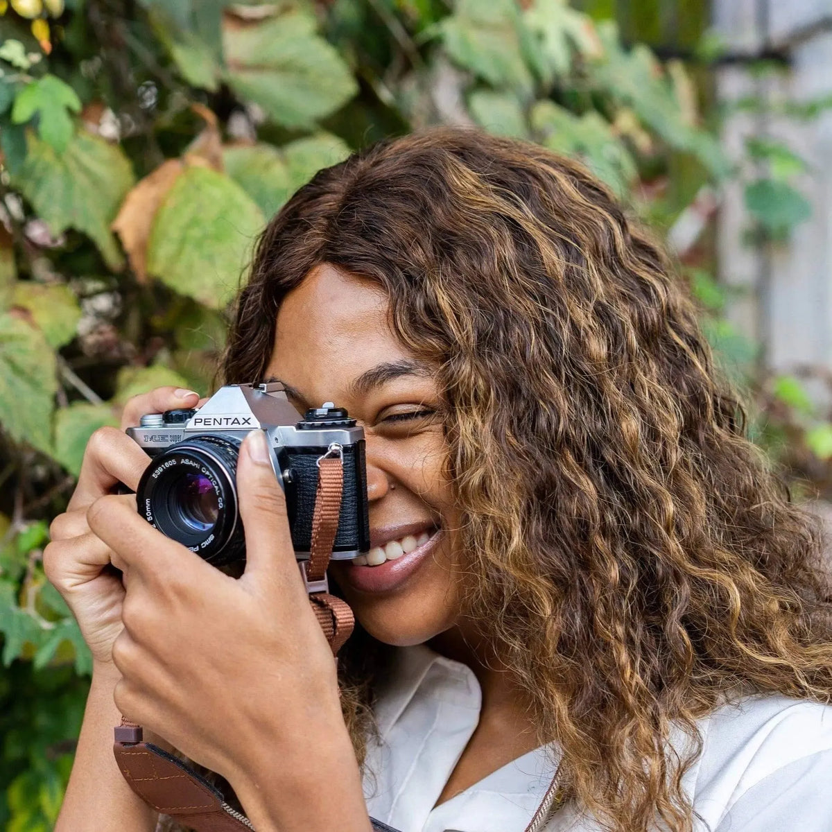 woman using the Pentax ME Super 35mm Film Camera 