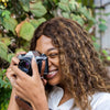 woman using the Pentax ME Super 35mm Film Camera 