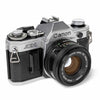 Canon AE-1 Bundle | 35mm Film Camera with Strap, Bag, and More! - Cute Camera Co.